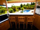 view from kitchen to the garden and the pool view from kitchen to the garden and the pool